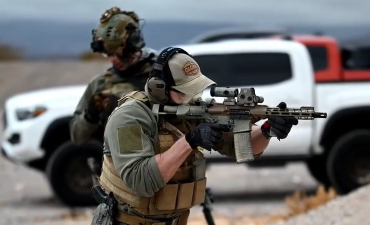 Armed professional conducting practical rifle training